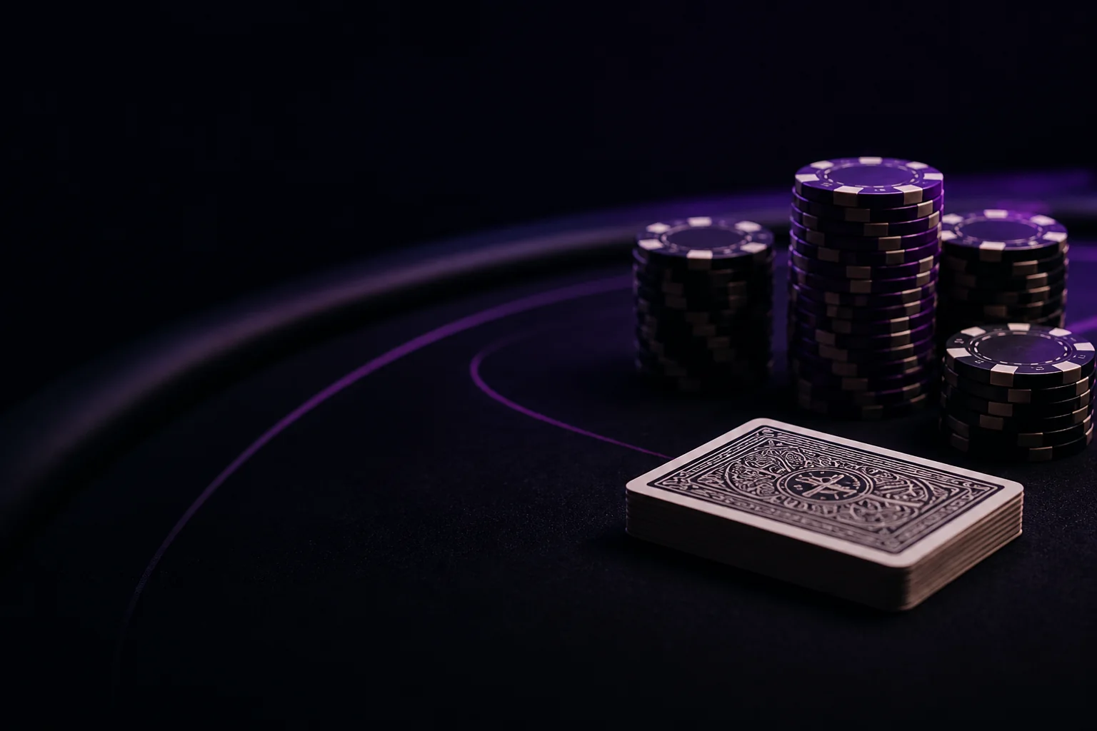 Poker chips and a deck of cards on a dark felt table